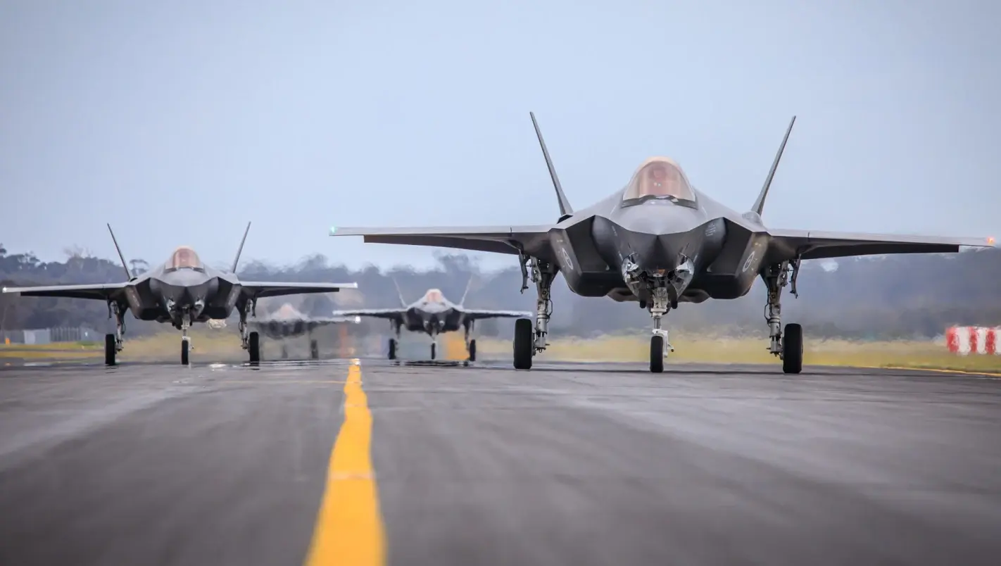No.3 Squadron F-35A Lightning II aircraft taxi into RAAF Base Williamtown from the US - Image: CPL Melina Young/Defence)